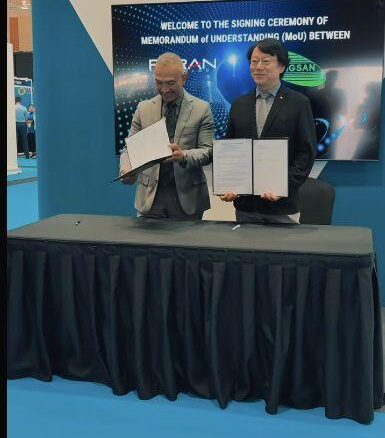 Feiran Technology and Songsan Drone Technologies representatives at their MyAERO Summit 2026 MoU signing