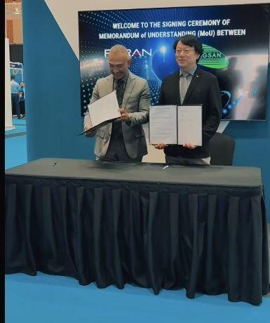 Feiran Technology and Songsan Drone Technologies representatives at their MyAERO Summit 2026 MoU signing